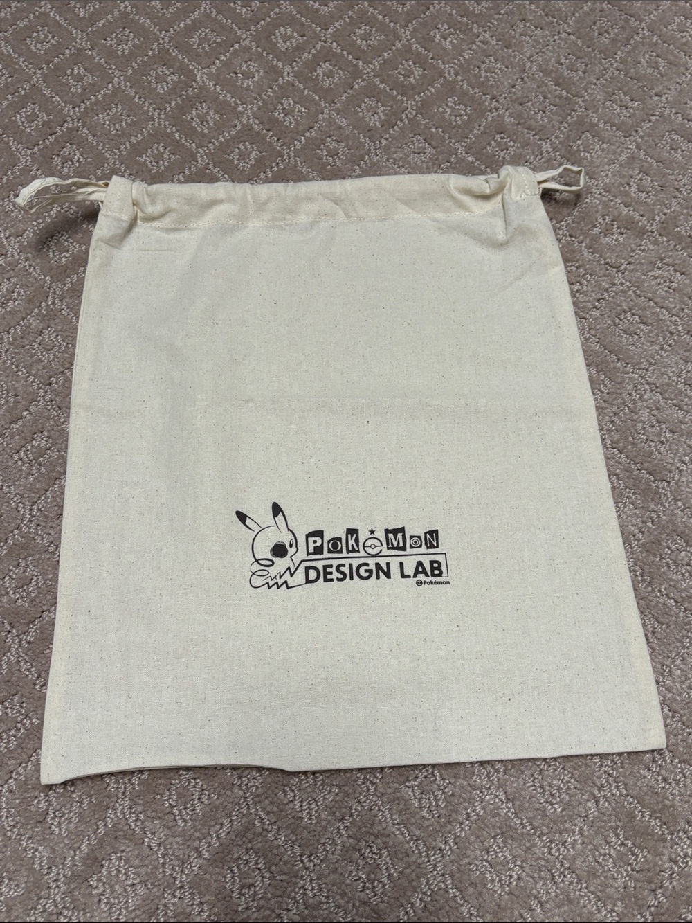 Pokémon Design Lab Drawstring by Dust Bag - Natural Canvas